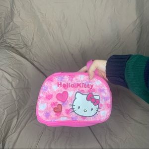 Cute hello kitty fuzzy purse.